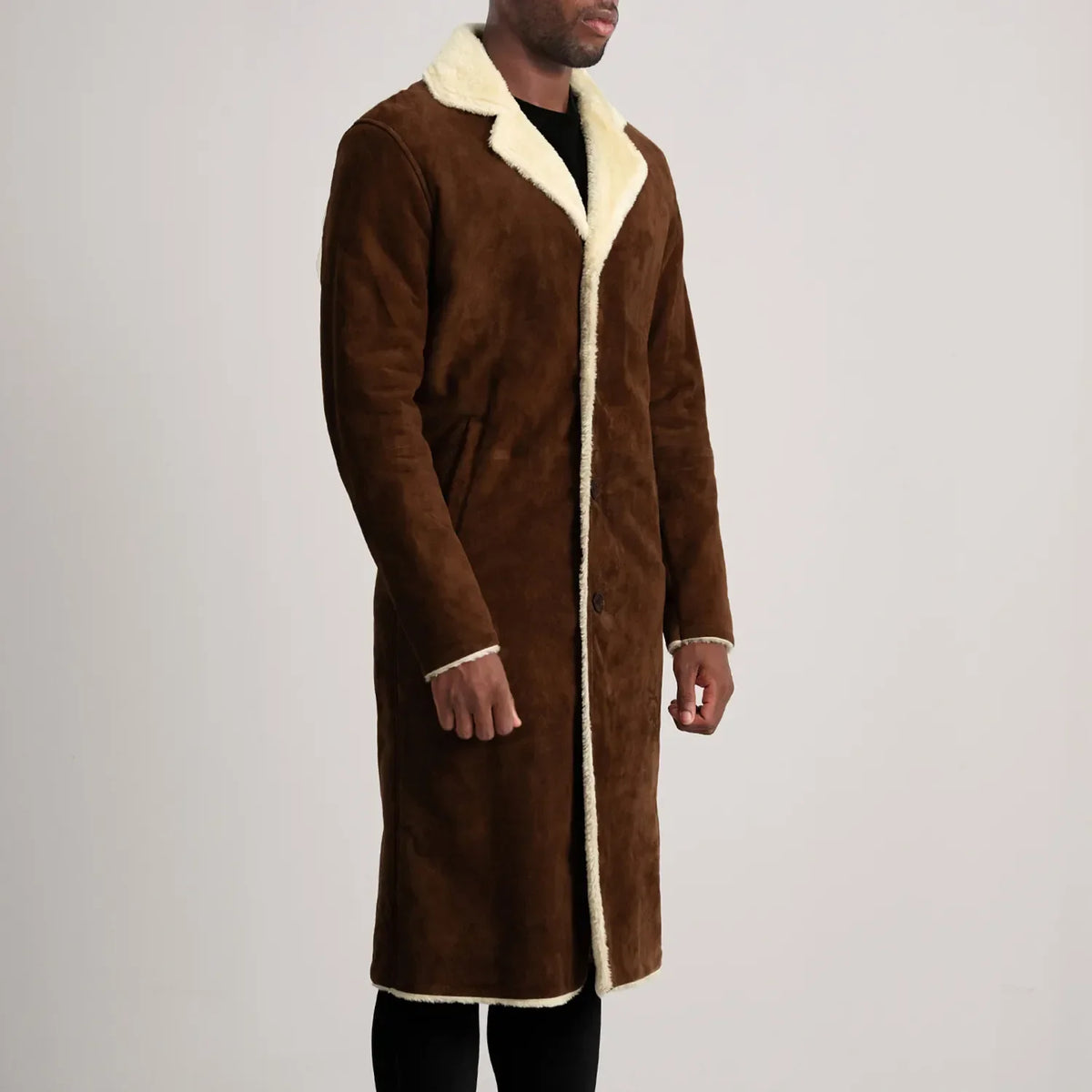 
Brown Goatskin Suede Aviator Jacket - Widok z tyłu z dopasowanymi ramionami i czystym dołem
