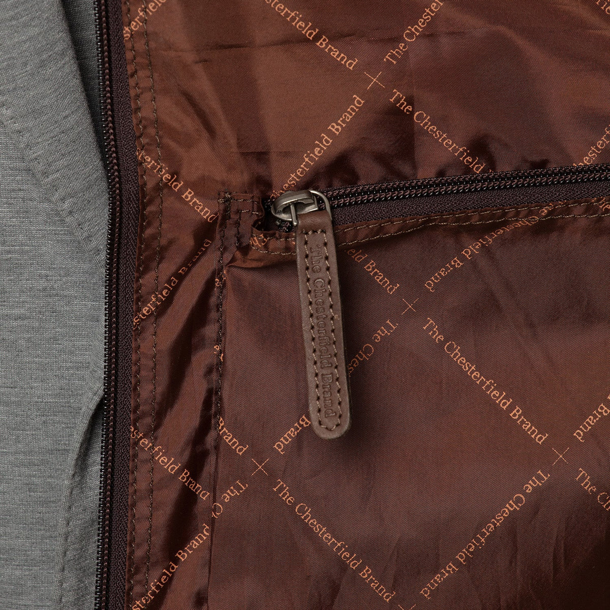 Styled Fit Perspective of Leather Garment Bag Josh Damska on Model - Natural Daylight Drape