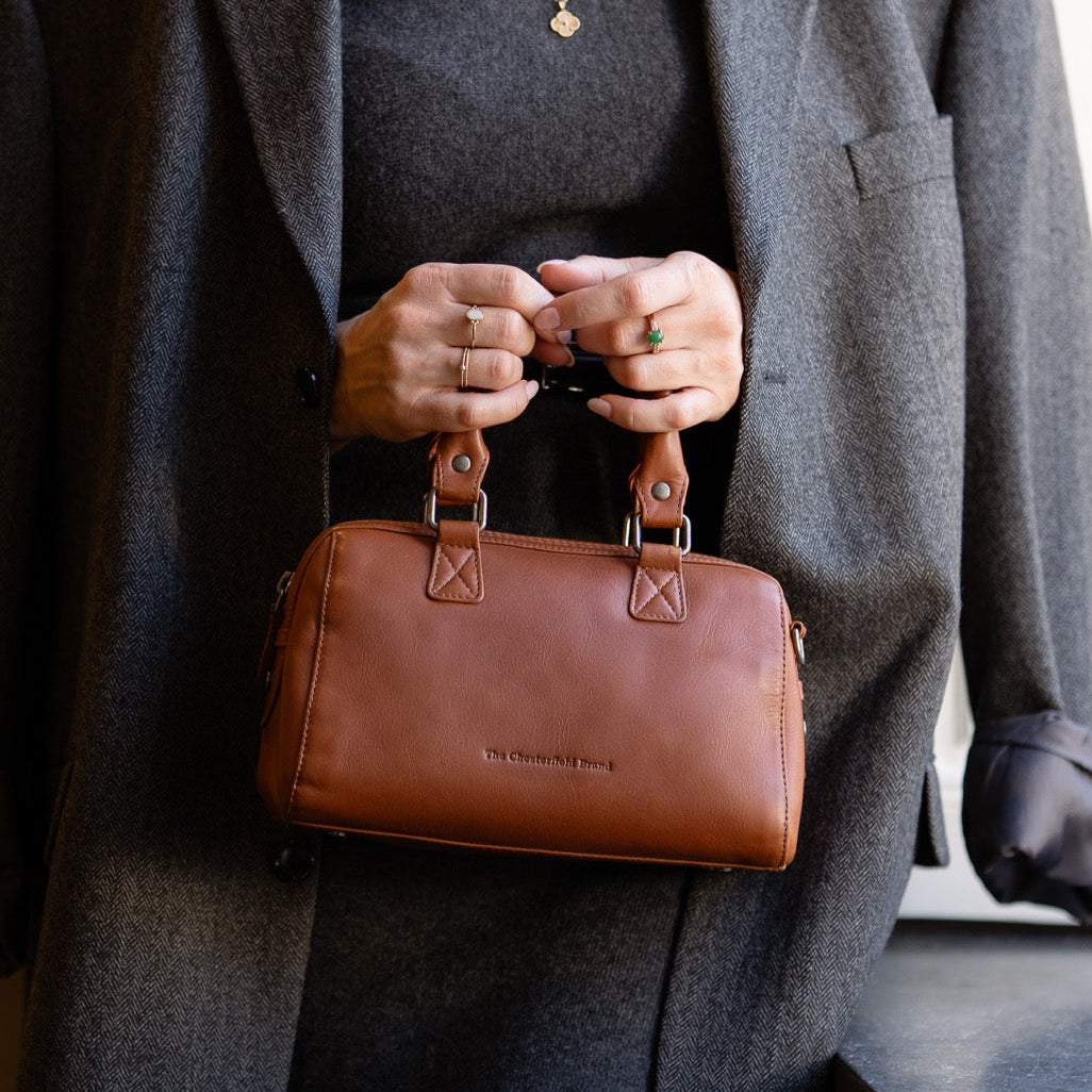 Styled Fit Perspective of Dalford Full-Grain Leather Handbag Damska on Model - Natural Daylight Drape