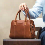 Styled Fit Perspective of Ezra Full-Grain Leather Handbag Damska on Model - Natural Daylight Drape