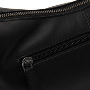 
100% Full-Grain Wax Pull-Up 100% Full-Grain Leather Grain Texture & Handcrafted Patina Detail