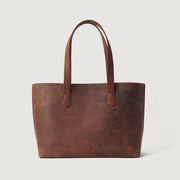 
The Bianca Vintage Distressed Brown Leather Tote Bag For Women - Profil boczny pokazujący pojemność i głębokość