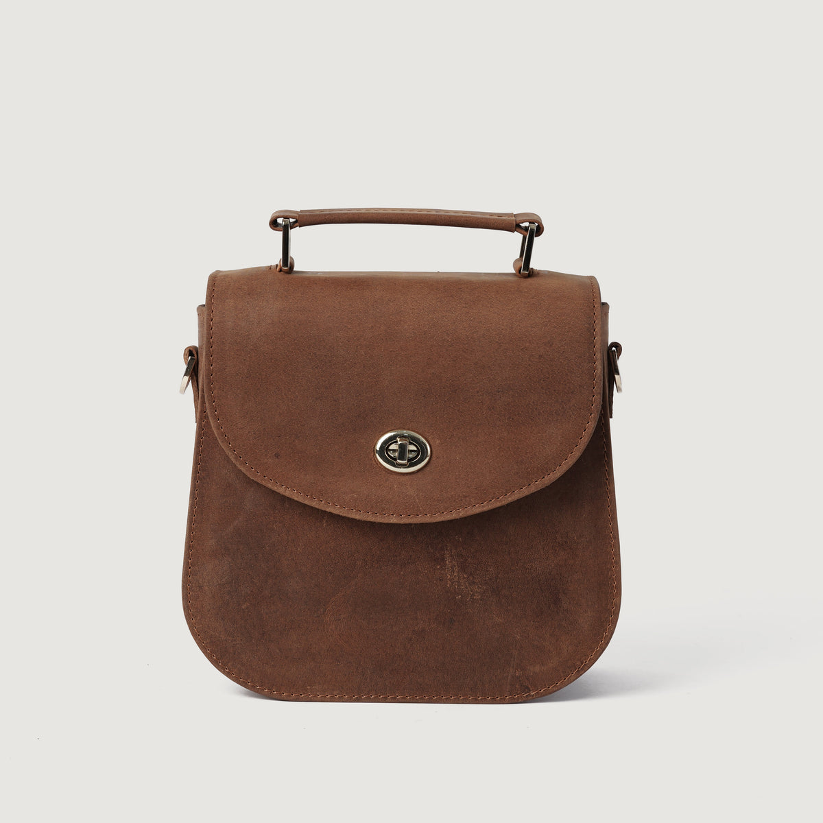 
The Sandra Vintage Jasnobrązowy Leather Saddle Bag For Women - Profil boczny pokazujący pojemność i głębokość